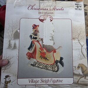 Villager Red and Cream Sleigh Figurine